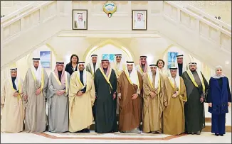  ?? KUNA photo ?? Kuwait’s Council of Ministers before the first Cabinet meeting.