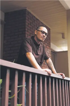  ?? Carlos Avila Gonzalez / The Chronicle ?? Brian Yang, who served 11 years for murder for aiding in a robbery that resulted in the death of a bus driver, stands at his parents’ home in Millbrae.