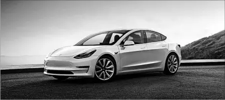  ?? TESLA INC. ?? The Tesla Model 3 sedan has increased consumer interest in EVs because of its price of $35,000. Other automakers have announced EV plans.