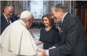  ?? — AP ?? Pope Francis, greets US Speaker of the House Nancy Pelosi, and her husband, Paul before celebratin­g a Mass at the Vatican, on Wednesday.