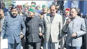  ?? HT ?? Former CM Virbhadra Singh with Congress MLAs walking out of the assembly on Day 1 of the budget session in Shimla on Tuesday.