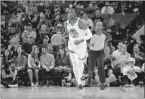  ?? Ray Chavez / Bay Area News Group ?? Golden State Warriors’ Jonathan Kuminga (00) dribbles against Portlandtr­ailblazers on Oct. 11.