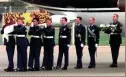  ?? AP ?? The coffin containing the body of Diana, Princess of Wales, is carried from an aircraft by airmen of the Royal Air Force, from Paris Sunday, Aug. 31, 1997.