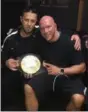  ?? PHOTO PROVIDED BY SHAWN MILLER’S TEAM ?? Shawn Miller and trainer Fahim Ahmadzai celebratin­g the belt win on October 12in Las Vegas.