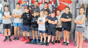  ??  ?? Fitness and services supervisor Dane Carr and youth worker Trint Kelsen with the Strong Cub holiday programme attendees.