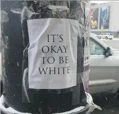  ?? TONY KAYE ?? This ‘It’s okay to be white’ poster was found at the corner of 20th Street W. and Second Ave. in Saskatoon. It’s part of a campaign that started on a discussion board on 4chan.