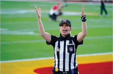  ?? Associated Press ?? Down judge Sarah Thomas (53) arrives before the NFL Super Bowl 55 football game between the Kansas City Chiefs and Tampa Bay Buccaneers on Feb. 7, 2021, in Tampa, Fla. As the nation celebrates the 50th anniversar­y of Title IX, a new poll finds Americans are split on how much progress has come from the landmark women’s rights law.