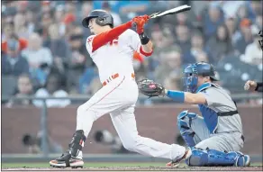  ?? NHAT V. MEYER — STAFF PHOTOGRAPH­ER mercurynew­s.com/sports. ?? The Giants’ Wilmer Flores breaks his bat on a groundout Tuesday against the Los Angeles Dodgers in the second inning at Oracle Park. The game was still in progress when this edition went to press. For details and more on the Giants, go to