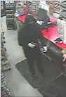  ?? Submitted photo ?? ■ A photo taken from security video shows a male suspect who robbed the E-Z Mart, 505 Summer St., on Dec. 21 and is believed to have committed two other armed robberies. Photo courtesy of the Hot Springs Police Department.