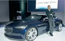  ??  ?? Vincent Boillot, Regional Manager - Sales - Eastern Canada, General Motors of Canada unveils the Buick Avista Concept for the first time in Canada at the 2017 Montreal Internatio­nal Auto Show