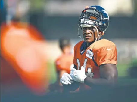  ??  ?? Broncos defensive end DeMarcus Ware takes the field for practice Tuesday, the 10th day of training camp. The team’s first preseason game is Friday night in Seattle, with an 8 p.m. MDT kickoff. John Leyba, The Denver Post