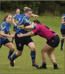  ??  ?? Rathdrum’s Noelle Ward drives forward against Carlow.