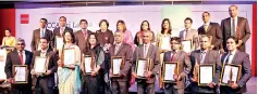  ?? ?? The fourteen winners at the ACCA Sri Lanka Sustainabi­lity Reporting Awards 2017 with Chief Guest South African High Commission­er Robina P. Marks, ACCA Sri Lanka Member Network Panel President Adrian Perera and ACCA Sri Lanka Country Manager Nilusha Ranasinghe