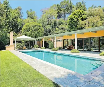  ?? TRIBUNE NEWS SERVICE ?? The one-time home of Hall of Fame baseball player Hank Greenberg is for sale in Beverly Hills at $9.5 million US. The 1957 house was designed as part of the U.S.’s Case Study program.