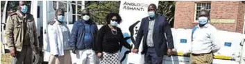  ?? Picture: ABONGILE SOLUNDWANA ?? HELPING HANDS: Local hospitals received 1,000 litres of sanitisers. Representi­ng them were, from left, Komani Hospital nursing manager Sithole Kune, Cofimvaba Hospital acting CEO Ntombesith­athu Qotoyi, Komani Hospital CEO Mzingisi Tshaka, Chris Hani department of health chief director Sindiswa Tywabi, AngloGold Ashanti stakeholde­r engagement manager for labour recruiting areas Khaya Magadla and Frontier Hospital acting CEO Dr Hubert Mushid