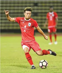  ??  ?? LEE GIL HOON ... the South Korean striker scores one and forces the own goal that puts Sabah in control of the friendly game against Sarawak at the Likas Stadium on Wednesday. - Photo courtesy of Augustine Jumat.