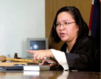  ?? (SUN.STAR FILE) ?? NOT ON THE LIST. The appointmen­t of former Cebu City judge Geraldine Faith Econg was questioned because she was not on the list of nominees for the 16th member of the Sandiganba­yan.