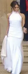  ??  ?? Wearing a bespoke silk crepe gown by Stella McCartney, the new Duchess of Sussex leaves with the Duke for their evening wedding reception at Frogmore House.