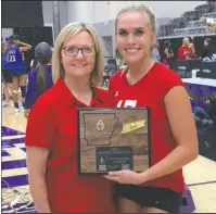  ?? The Sentinel-Record/James Leigh ?? MOST OUTSTANDIN­G PLAYER: Fountain Lake graduate and Henderson State commit Olivia Cox, right, was named the Most Outstandin­g Player for the West team Friday in the Arkansas High School Coaches Associatio­n’s All-Star volleyball match at the Farris Center in Conway. She was accompanie­d by West assistant coach Tina Moore, head coach for the Cobras.