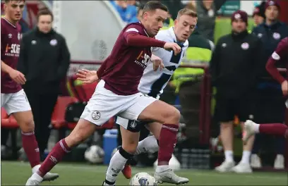  ?? Image: David Wardle. ?? DELIGHTED GAFFER: Michael Tidser, pictured in action against Calvin Miller when the teams met in February, was proud of his Kelty Hearts team’s performanc­e at Falkirk on Saturday.