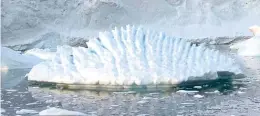  ?? GETTY IMAGES ?? An iceberg at Rothera Research Station on the Antarctic Peninsula.