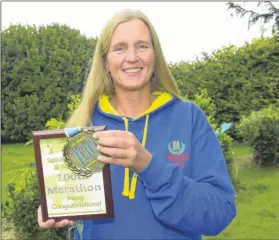  ??  ?? Mum-of-10, Debbie Sterling has completed 100 marathons