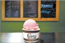  ??  ?? Coppa’s owner Marc Wheeler makes frosty treats by hand. He uses rhubarb from local farmers in his rhubarb sorbet.