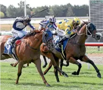  ?? PHOTO: RACE IMAGES ?? Fairlight (inside) will jump up to Group III level in Saturday’s Valachi Downs South Island Breeders’ Stakes.