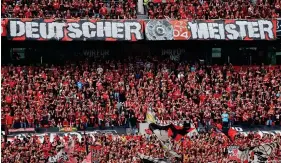  ?? Bild: Wolfgang Rattay/REUTERS ?? Bayer Leverkusen ist das erste Team in der Bundesliga-Geschichte, das ungeschlag­en Deutscher Meister wird