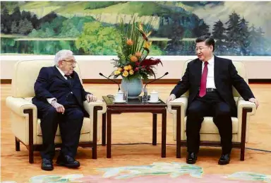  ?? Pang Xingle/Xinhua ?? Henry Kissinger e Xi Jinping se reuniram em Pequim