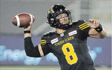  ?? PETER POWER THE CANADIAN PRESS FILE PHOTO ?? QB Jeremiah Masoli leads the Hamilton Tiger-Cats. Hamilton is leading the CFL in net yards this season at 447.5 per game.