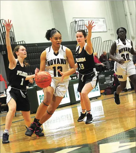  ??  ?? Woonsocket junior wing Erinee Agyemang (12) is one of the big reasons the No. 3 Novans are back in a division final for the first time in a decade. Agyemang made big plays late in Thursday night’s Division III semifinal to secure Woonsocket a 47-40 win over No. 7 Pilgrim.