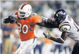  ?? MARC SEROTA/GETTY IMAGES ?? At UM, Tyrone Moss led the ACC in touchdowns in 2005 with 12. In high school, he gained more than 7,100 yards for Blanche Ely, a Broward County record.