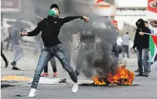  ?? Foto: Reuters ?? Nevzdáme se Protesty Palestinců proti rozhodnutí Trumpa uznat Jeruzalém hlavním městem Izraele včera pokračoval­y už 16. dnem.