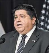  ?? YOUNGRAE KIM/CHICAGO TRIBUNE ?? Illinois Gov. J.B. Pritzker speaks during a news conference at the Thompson Center in Chicago on Oct. 14.