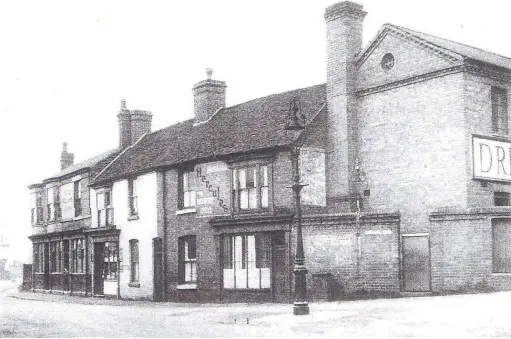  ??  ?? Harriet’s little shop at number 58 Flood Street, nestled between the Good Fellows Arms at far left, and Horace Broom’s former bicycle and wireless accessorie­s shop.also note the gentlemen’s urinal which was attached to the old Dresscott Clothing factory at right