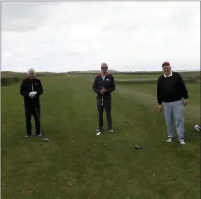  ??  ?? Playing social golf at Castlegreg­ory Golf Club on Monday were, from left Sean O’Connor, Noel Earlie and Dan Healy.