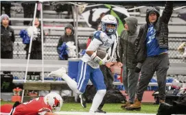  ?? Pete Paguaga/Hearst Connecticu­t ?? West Haven’s Armani Reid turns up field on his way to a touchdown during the Class LL football semifinals against Greenwich on Sunday.