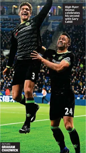  ?? PICTURE: GRAHAM CHADWICK ?? High flyer: Alonso celebrates his second with Gary Cahill