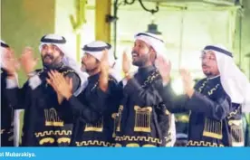  ??  ?? KUWAIT: Photograph­s show TV folk band perform at Mubarakiya.