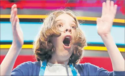  ?? AP PHOTO ?? Erin Howard, 12, from Huntsville, Ala., reacts after spelling her word correctly during the 90th Scripps National Spelling Bee, Thursday, June 1, 2017, in Oxon Hill, Md.