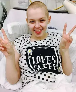  ??  ?? Bravery of a survivor: Kira Noble in hospital in Edinburgh