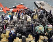  ?? MARCO BELLO / REUTERS ?? Packages of cocaine and marijuana seized from multiple interdicti­ons are seen on deck before being unloaded from US Coast Guard vessel James in Port Everglades in Florida on Feb 17.