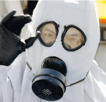  ?? AFP/GETTY IMAGES ?? The federal government is proposing regulation­s where labs would need to assign biosafety officers and apply for licences good for one to five years, depending on the pathogen.