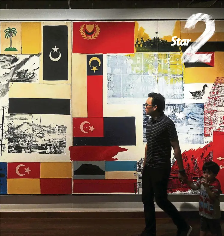  ?? — Bernama ?? Visitors walk by legendary American artist Robert Rauschenbe­rg’s Yang Teragung (mixed media, 1989) painting, which is on show at the Negaraku exhibition. This work was part of the Rauschenbe­rg Overseas Cultural Exchange Series in this region in the...