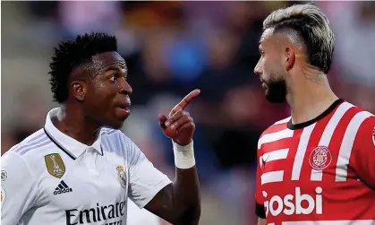  ?? Photograph: Eric Alonso/Getty Images ?? Vinícius Júnior confronts Girona’s Taty Castellano­s during Real Madrid’s defeat.
