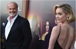  ?? — AP ?? Kelsey Grammar, left, and his daughter, Greer Grammar, arrive at the Los Angeles premiere of The Last Tycoon on Thursday.