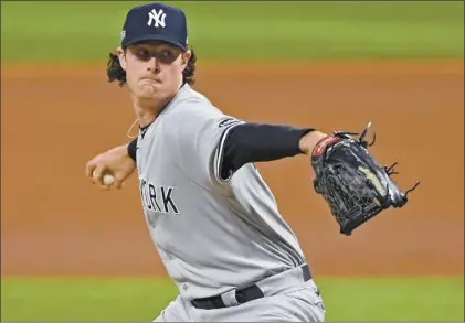 ??  ?? New York Yankees’ Gerrit Cole struck out 13 during Game 1 of an American League wild-card series against the Cleveland Indians on Tuesday.