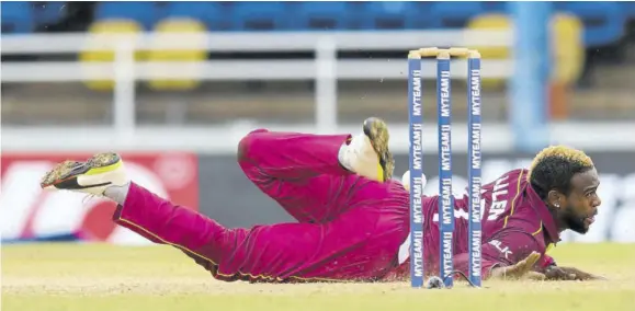  ?? (Photo: AFP) ?? Fabian Allen of West Indies dives to stop the ball during the third One-day Internatio­nal versus India at Queen’s Park Oval in Port of Spain, Trinidad and Tobago, on August 14, 2019.