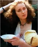  ??  ?? Nurture: Lily’s mum Patience feeding her in the Eighties